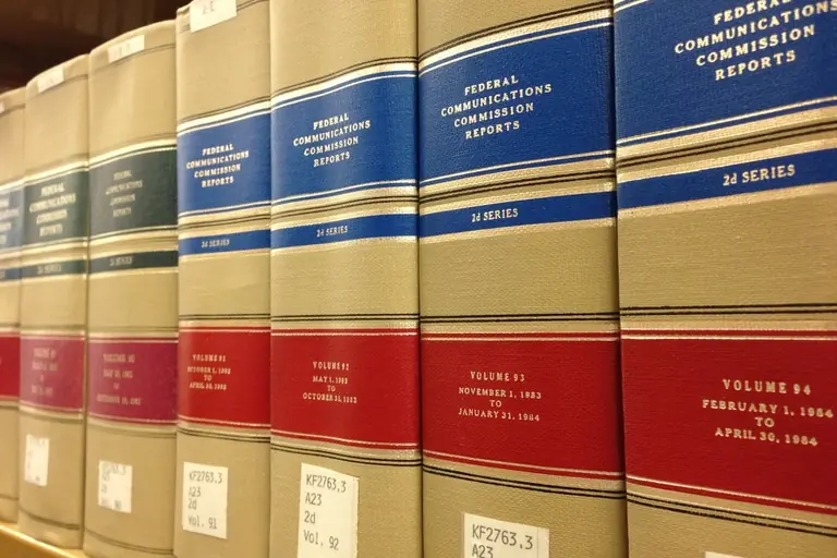 Law reports lined up on a shelf